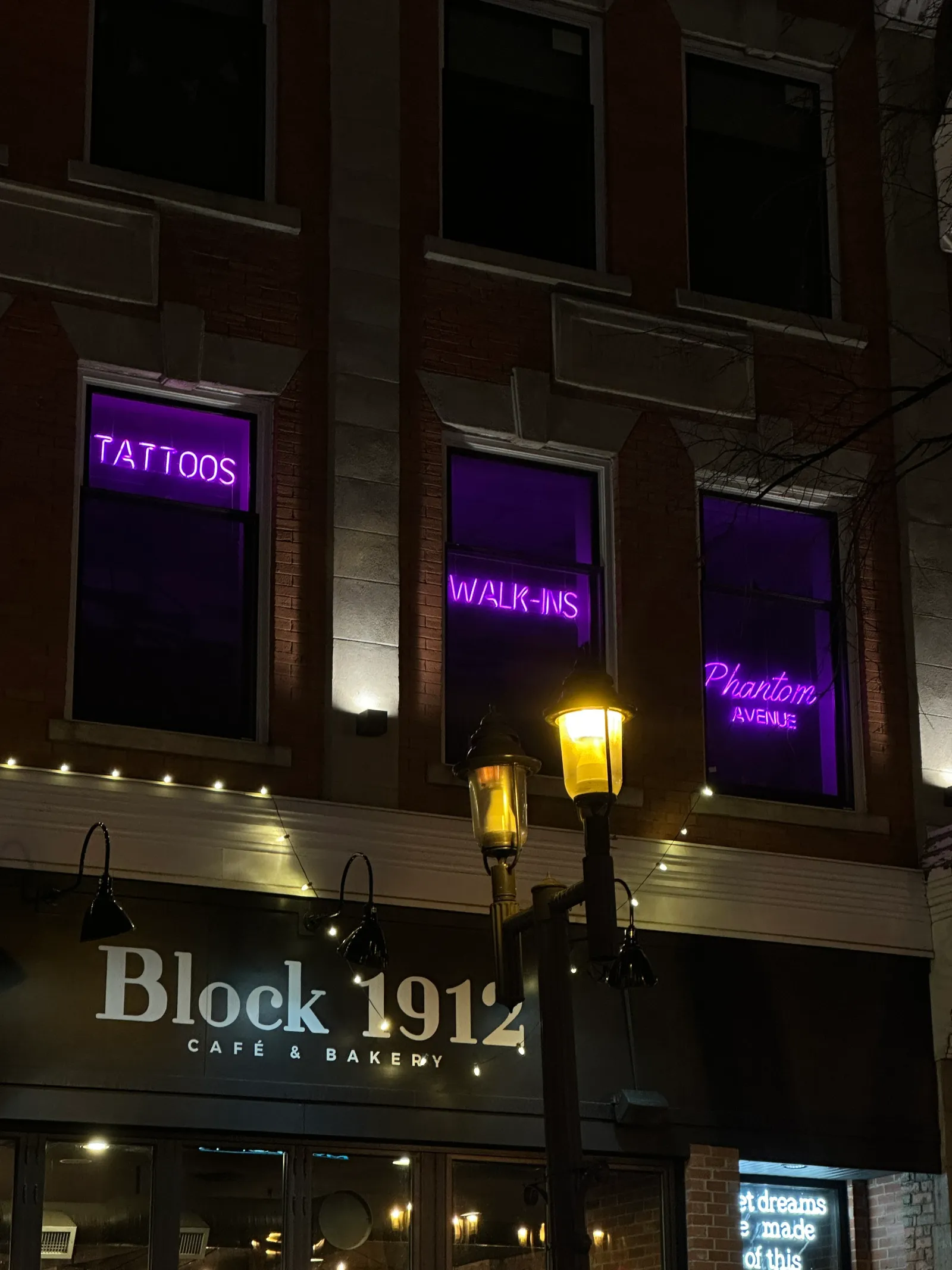 Phantom Avenue tattoo studio windows on Whyte Avenue