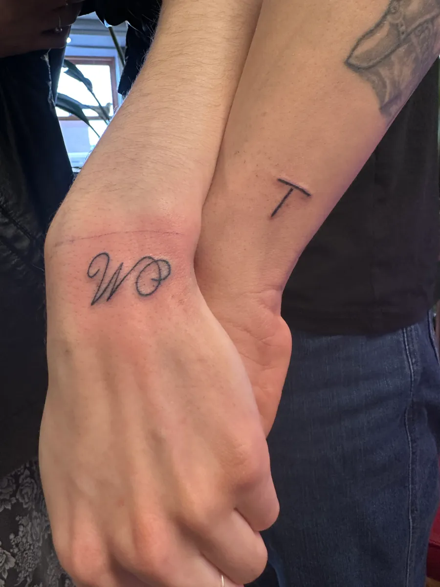 Fine line initial tattoo on the wrist, Phantom Avenue Edmonton