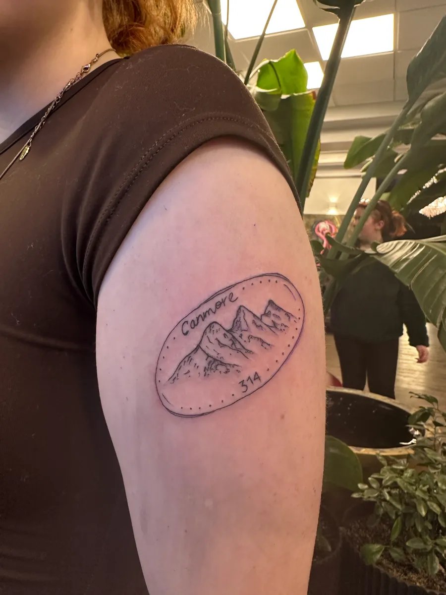 Fine line tattoo on the upper arm, Phantom Avenue Edmonton