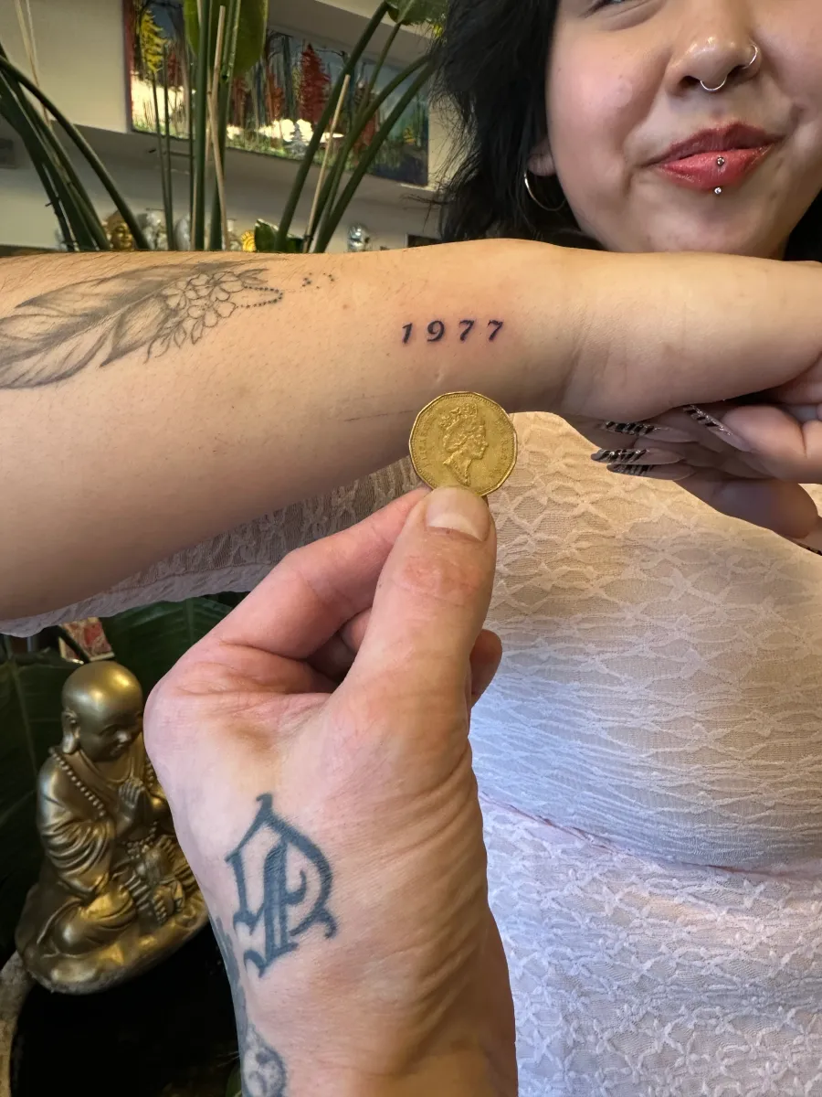 Fine line lettering tattoo on the forearm, Phantom Avenue Edmonton