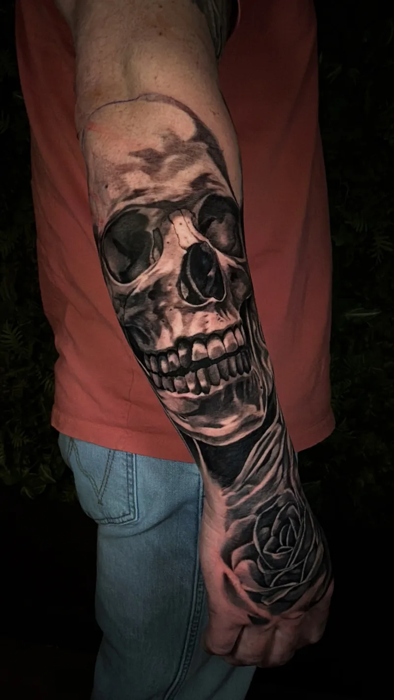 Black and grey tattoo by Juan Del Pino at Phantom Avenue Edmonton