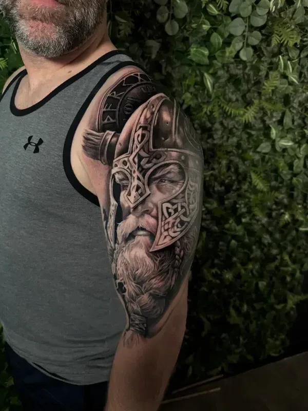 Black and grey tattoo by Juan Del Pino at Phantom Avenue Edmonton