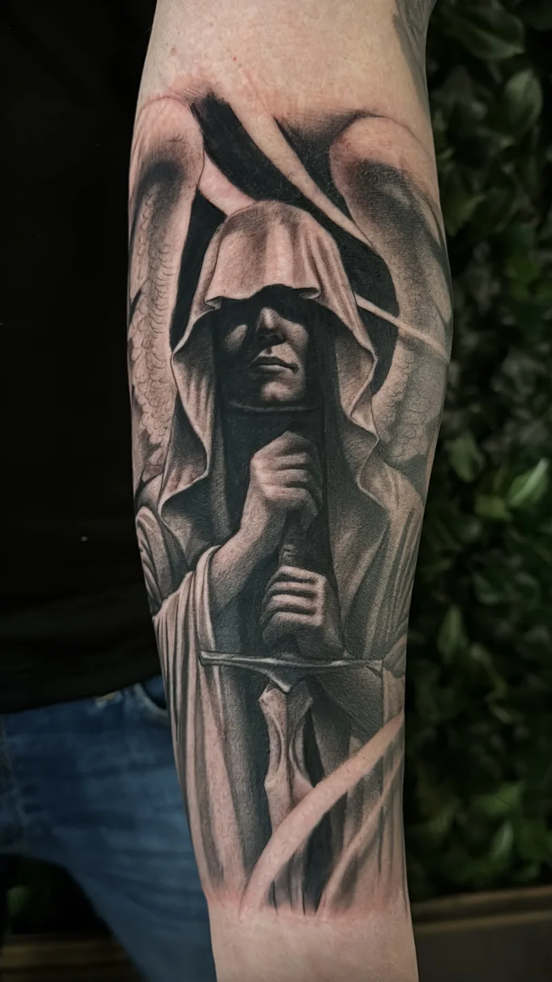 Black and grey tattoo by Juan Del Pino at Phantom Avenue Edmonton