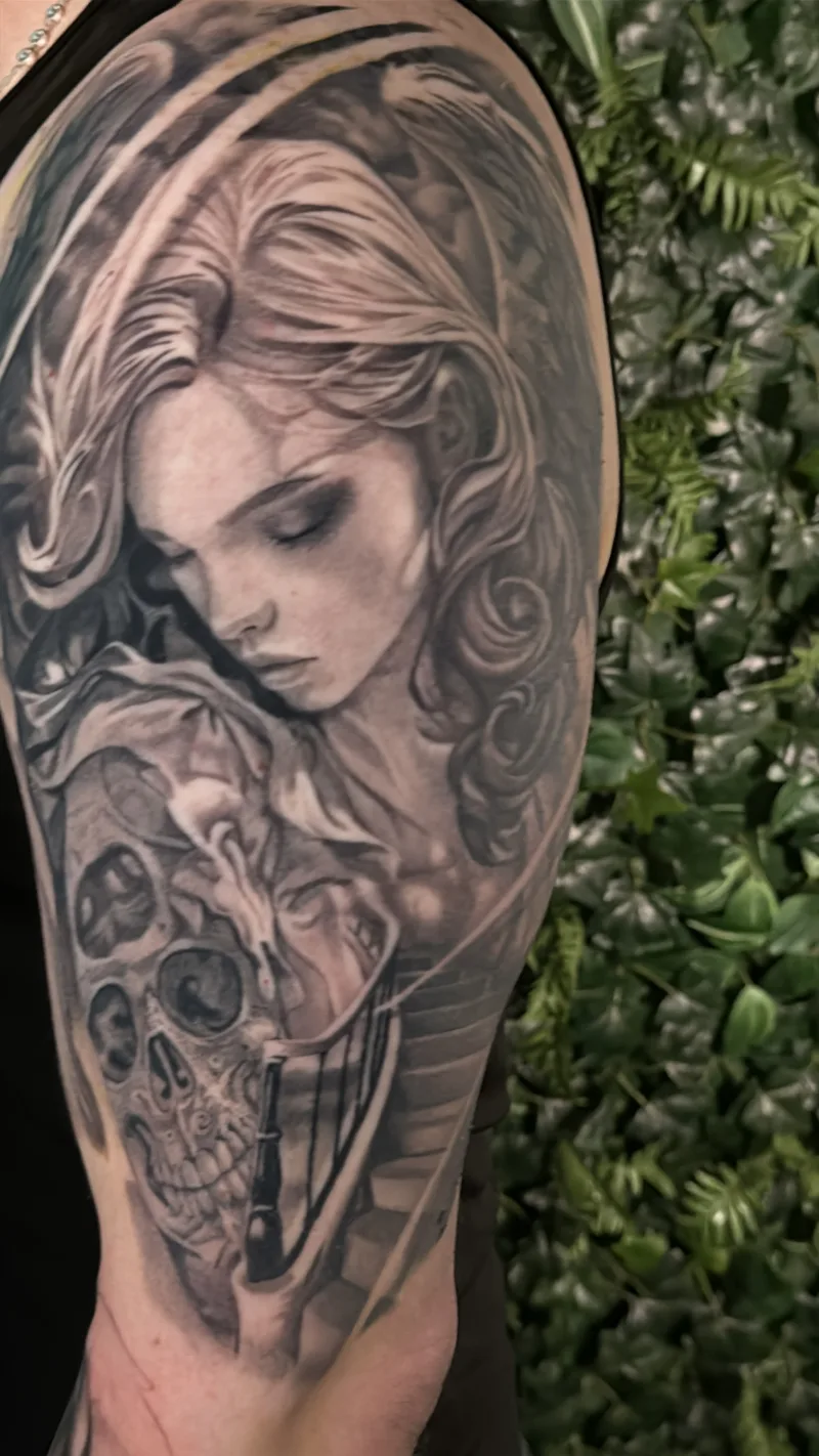 Black and grey tattoo by Juan Del Pino at Phantom Avenue Edmonton