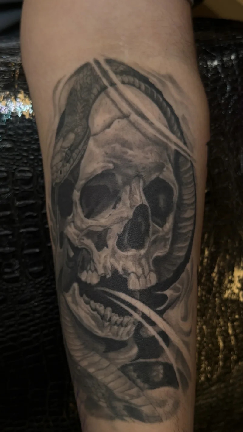 Black and grey tattoo by Juan Del Pino at Phantom Avenue Edmonton