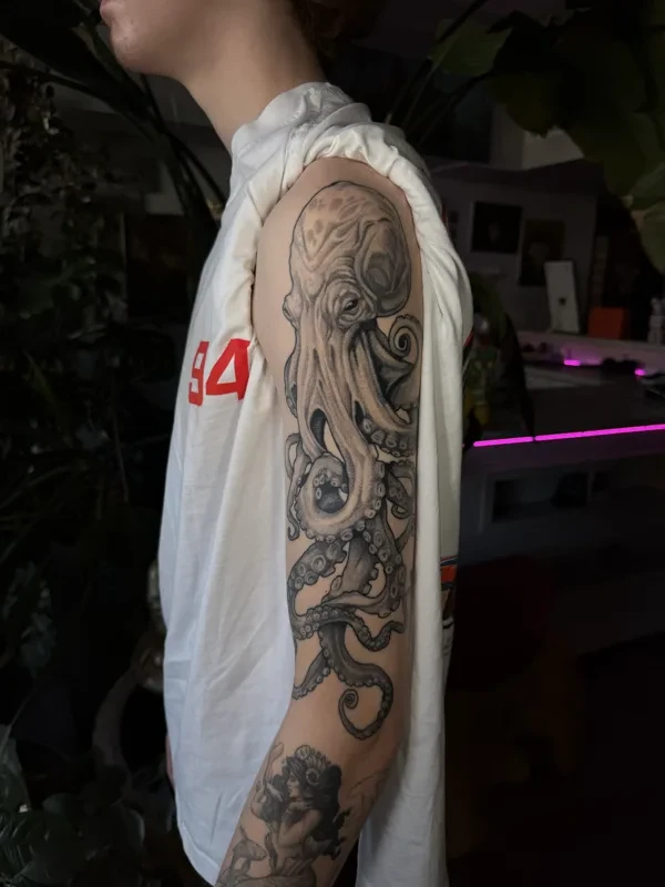 Black and grey tattoo by Juan Del Pino at Phantom Avenue Edmonton